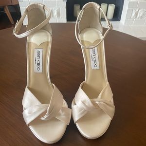 Jimmy Choo ivory heels.